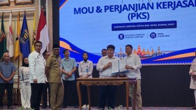 Ketua Koperasi Marsuki Ragil Teken MoU Kerja Sama Program MBG pada Pengukuhan APPMBGI Lampung