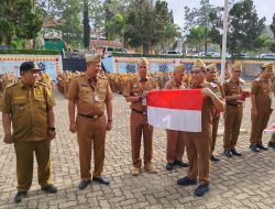 Sekda Tanggamus Pimpin Apel Pagi dan Pencanangan Gerakan Pembagian Bendera Merah Putih Tahun 2026